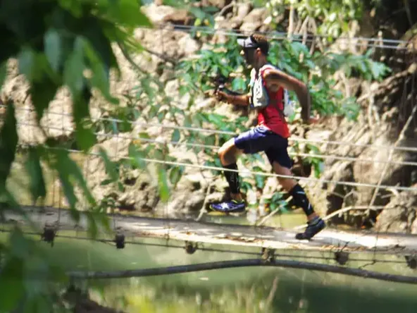 Runner crossing a bridge